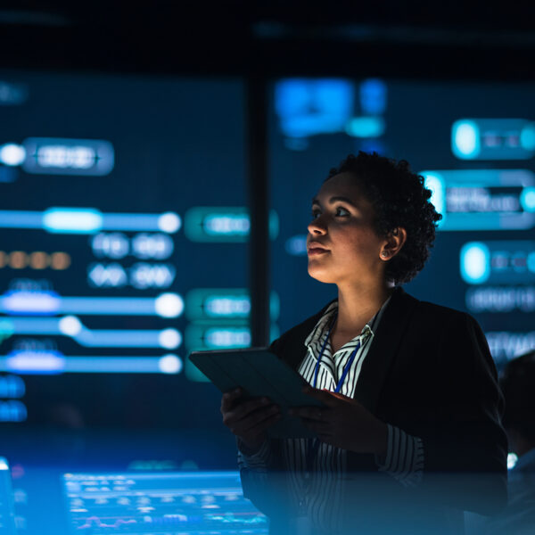 Woman with tablet with digital background